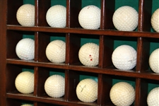 Forty-Eight (48) Dimple & Mesh Pattern Golf Balls in Wood Display Case