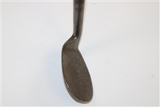 A. Mercer Tomahawk Accurate Niblick Hand Punched Golf Club