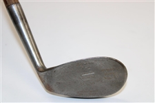 A. Mercer Tomahawk Accurate Niblick Hand Punched Golf Club