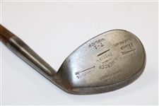 A. Mercer Tomahawk Accurate Niblick Hand Punched Golf Club