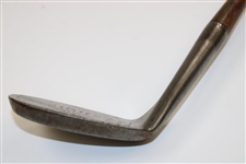 A. Mercer Tomahawk Accurate Niblick Hand Punched Golf Club