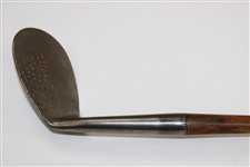 A. Mercer Tomahawk Accurate Niblick Hand Punched Golf Club