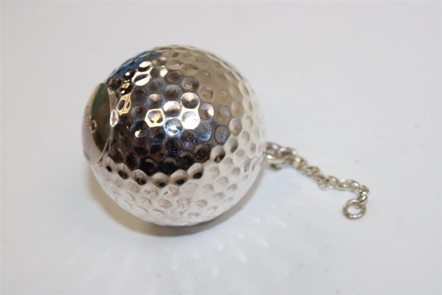 Chi-Chi Rodriguez's 1990 Garrard Jewelers Silver Golf Ball with Chain in Original Box