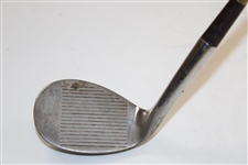 Craig Stadler's Personal Used Wilson R-90 Original Sand Iron
