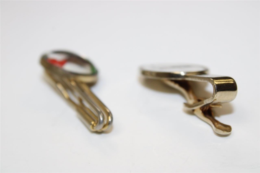 A Pair of 2 Golfer Swinging Decorative Gold-Tone Clips