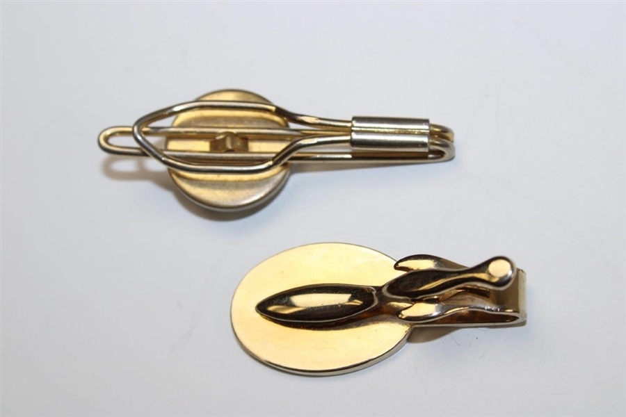 A Pair of 2 Golfer Swinging Decorative Gold-Tone Clips
