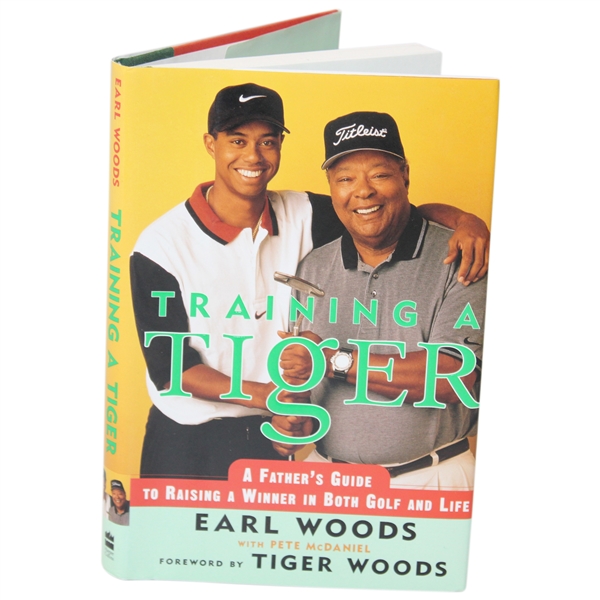 Earl Woods Signed 1997 Training A Tiger Book by Earl Woods JSA ALOA