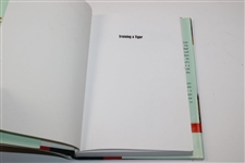 Earl Woods Signed 1997 'Training A Tiger' Book by Earl Woods JSA ALOA