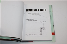 Earl Woods Signed 1997 'Training A Tiger' Book by Earl Woods JSA ALOA