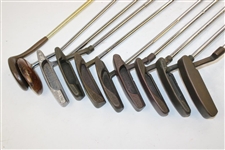 Ten (10) Various Putters Including Eight (8) Assorted PING Putters, a Brass Playboy & a Woodie Putter