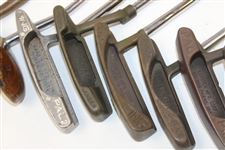 Ten (10) Various Putters Including Eight (8) Assorted PING Putters, a Brass Playboy & a Woodie Putter