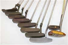 Ten (10) Various Putters Including Eight (8) Assorted PING Putters, a Brass Playboy & a Woodie Putter