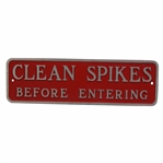 Clean Spikes Before Entering Metal Sign