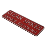 Clean Spikes Before Entering Metal Sign