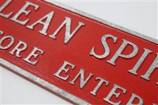 Clean Spikes Before Entering Metal Sign