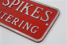 Clean Spikes Before Entering Metal Sign