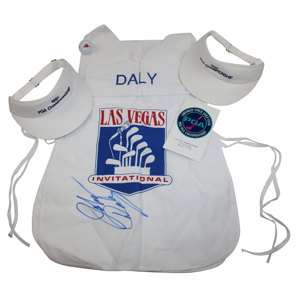 John Daly Signed Las Vegas Inv. Caddy Bib w/1991 PGA Visors & Guide w/Personal Logo Ball JSA ALOA