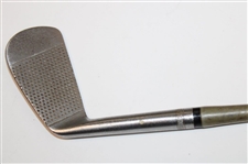 Babe 'Didrickson' Zaharias’ Personal Model MacGregor 3-Iron with Auction Program & Tag - Attributed
