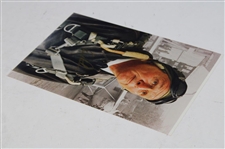 Arnold Palmer Signed Wearing Flightsuit 8x12 Photo JSA ALOA