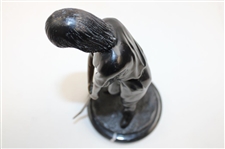 Statue Of Female Golfer Lining Up An Iron Shot 