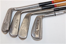 Four Chippers Or Jiggers Including Spalding #12 w/Coated Shaft, First Flight #29 w/Coated Shaft (cracked), Kenneth Smith #11 & Burke #4A Stainless