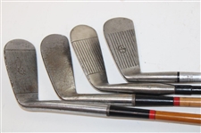 Four Chippers Or Jiggers Including Spalding #12 w/Coated Shaft, First Flight #29 w/Coated Shaft (cracked), Kenneth Smith #11 & Burke #4A Stainless