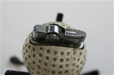 Vintage Dimple Pattern Golf Ball Themed Lighter on Three (3) Crossed Clubs Stand