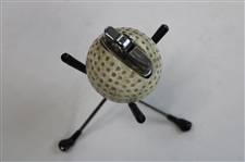 Vintage Dimple Pattern Golf Ball Themed Lighter on Three (3) Crossed Clubs Stand