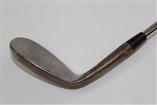 Greg Norman's Personal Used Titleist 'G.N.' 57 Degree Wedge with Lead Tape