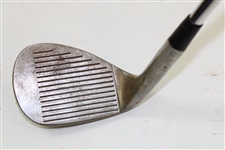 Greg Norman's Personal Used Unmarked Pitching Wedge with Lead Tape