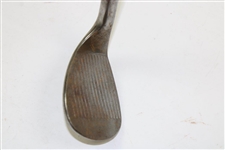 Greg Norman's Personal Used Unmarked Pitching Wedge with Lead Tape