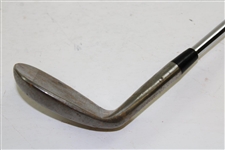 Greg Norman's Personal Used Unmarked Pitching Wedge with Lead Tape