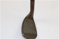 Greg Norman's Personal Used Unmarked Pitching Wedge with Lead Tape
