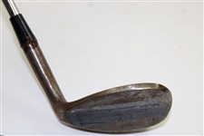 Greg Norman's Personal Used Unmarked Pitching Wedge with Lead Tape