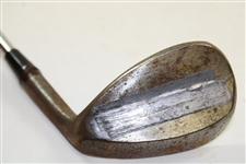 Greg Norman's Personal Used Unmarked Pitching Wedge with Lead Tape