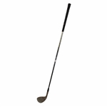 Greg Norman's Personal Used Unmarked Pitching Wedge with Lead Tape