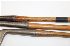 Three (3) Wood Shaft Clubs Bridgeport BGI Smooth Face Putter, Spalding Long Blade Putter & T. Stewart 4 Iron