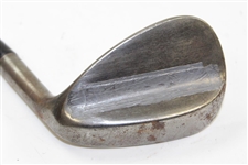 Greg Norman's Personal Used Unmarked Wedge with Lead Tape on Back