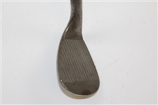 Greg Norman's Personal Used Unmarked Wedge with Lead Tape on Back 