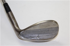 Greg Norman's Personal Used Unmarked Wedge with Lead Tape on Back 
