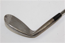 Greg Norman's Personal Used Unmarked Wedge with Lead Tape on Back 