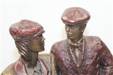 Pair of Male and Lady Austin Sculpture Statues - Leaning on Clubs