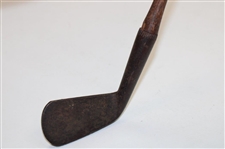 A Johnson & Company Guaranteed Hand Forged Long Iron