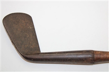 A Johnson & Company Guaranteed Hand Forged Long Iron