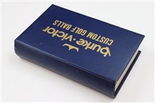 Fifteen (15) Logo Golf Balls in Burke Victor Custom Book Display Box