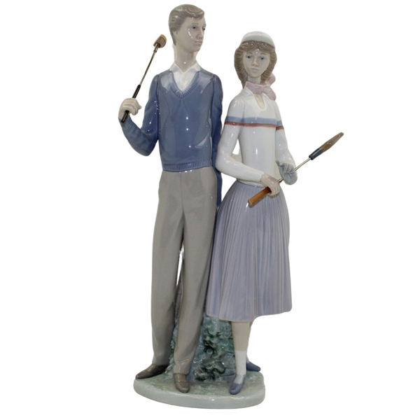 Statue Of Male & Female Golfers by Llardro