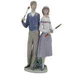 Statue Of Male & Female Golfers by Llardro