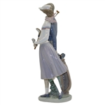 Statue Of Male & Female Golfers by Llardro
