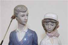 Statue Of Male & Female Golfers by Llardro