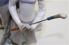Statue Of Male & Female Golfers by Llardro